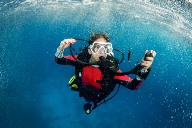 istock Scuba diver girl making an ascent 1067740558