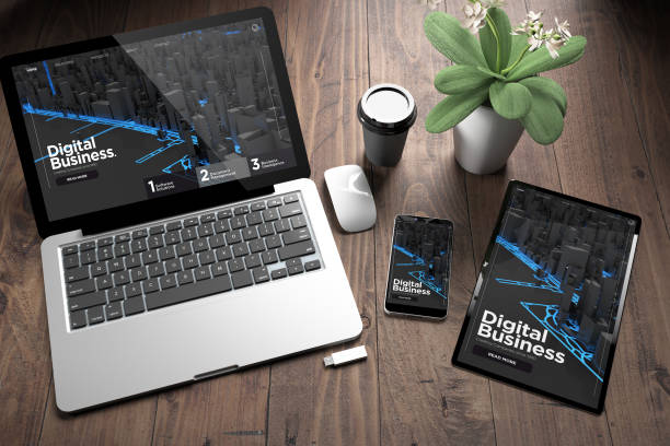 istock three devices on wooden desk top view digital business 1067747778