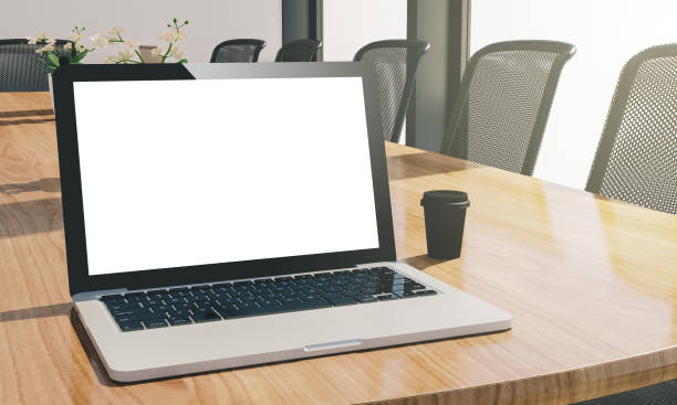 istock blank screen laptop at conference room mockup 1067747842