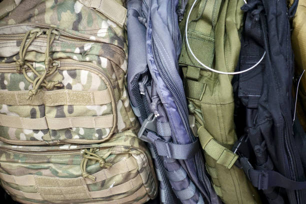 istock Multicolored fashionable backpacks as a background. 1067748630