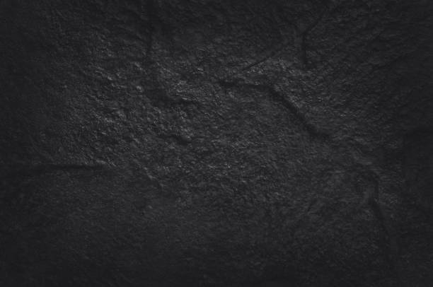 istock Dark grey black slate texture in natural pattern with high resolution for background and design art work. Black stone wall. 1067748678