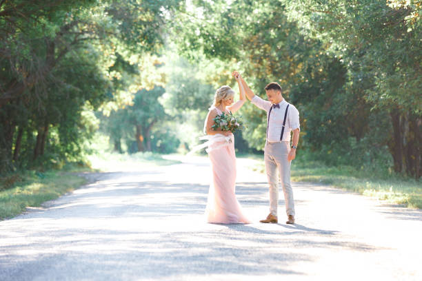 istock wedding couple on the nature in summer day. 1067751626
