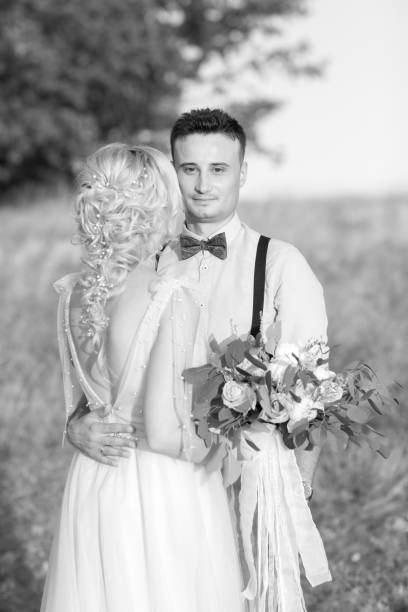 istock wedding couple on the nature in summer day. 1067752886