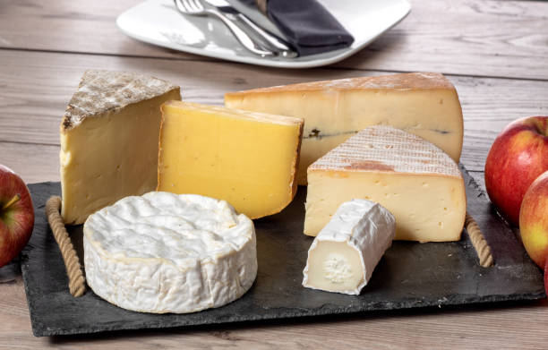 istock the different french cheeses on the black plate 1067752972