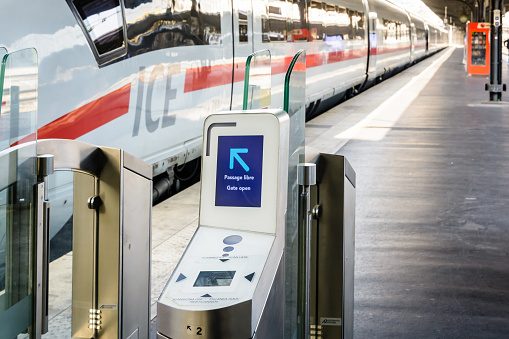 Paris, France - October 18, 2018: Ticket gates are installed on a platform in Paris Gare de l'Est train station to control access to an ICE high speed train from german company Deutsche Bahn.