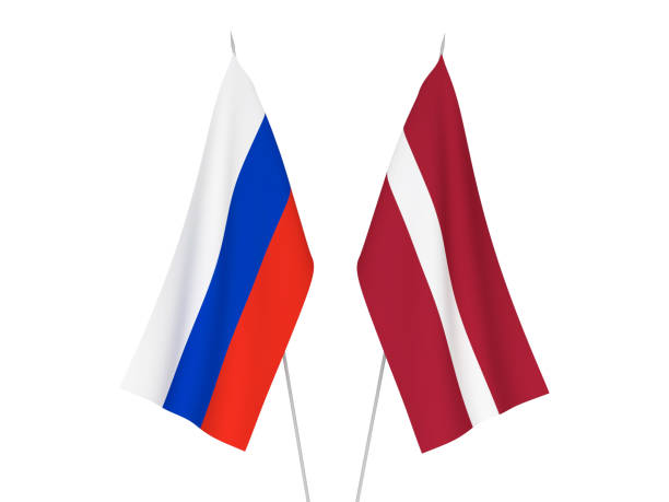 istock Russia and Latvia flags 1067755778
