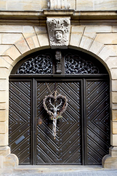Decorative Christmas season wrath with a deer on a wooden door