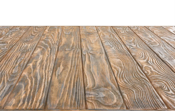 istock surface of brown wooden planks on white background 1067759276