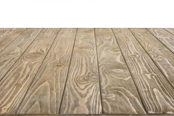 istock surface of brown wooden planks on white background 1067759356