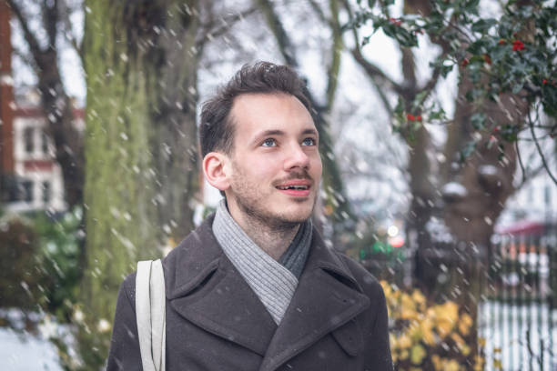 istock A handsome young man in winter snow 1067762132