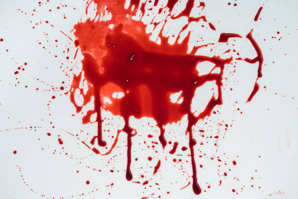 istock top view of blood blot on white surface 1067765656