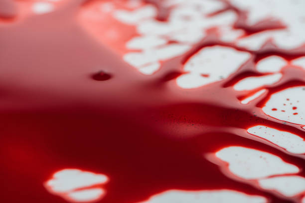 istock close-up shot of blood blot on white surface 1067765690