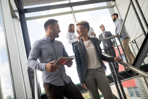 istock Picture of architects talking about project in hall 1067767078