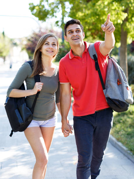 istock Man and his girlfriend are walking and resting 1067767212