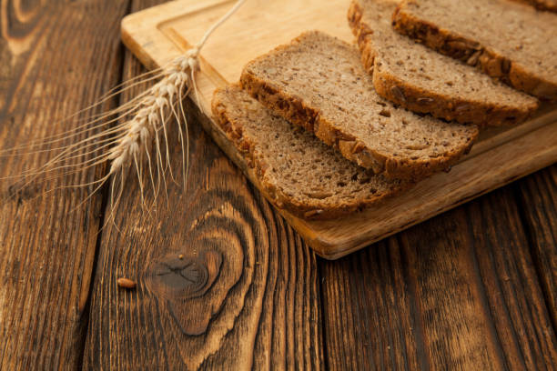 istock sliced grain bread on a wooden Board 1067767800