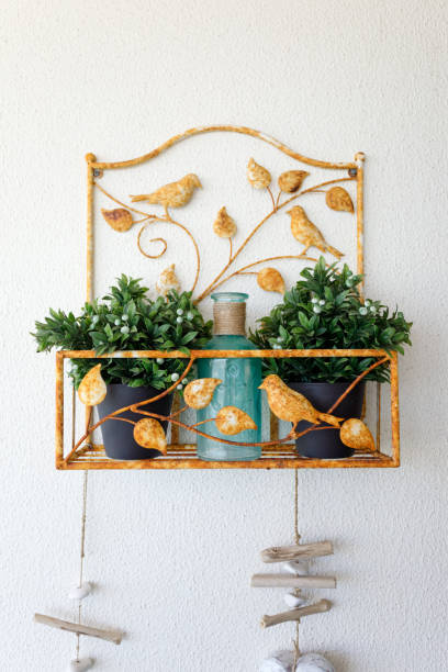 istock Bird Motif Rustic Shelf and Plants - Home Decor 1067772500