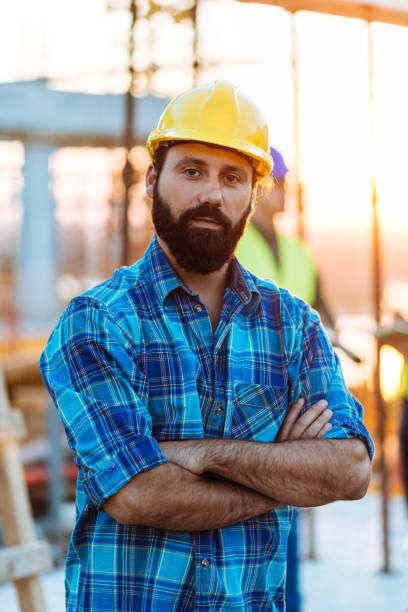 istock Portrait of group of engineers and architects on construction site 1067777480