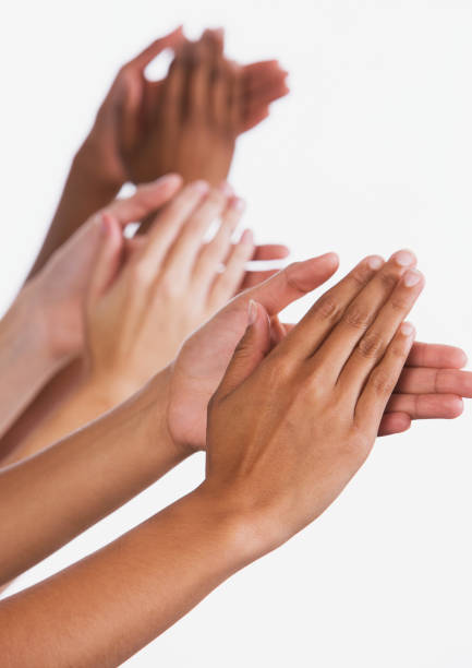 istock Three mixed pairs of hands applaud enthusiastically 1067779222