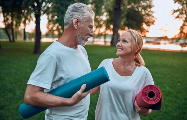 istock Senior couple doing sport outdoors 1067789764
