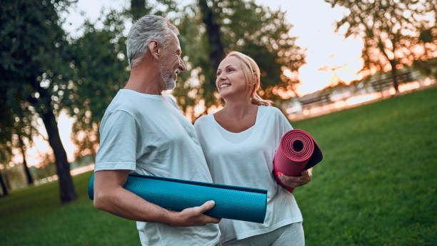 istock Senior couple doing sport outdoors 1067790198