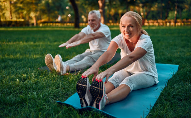 istock Senior couple doing sport outdoors 1067790818