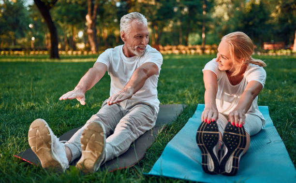 istock Senior couple doing sport outdoors 1067790832