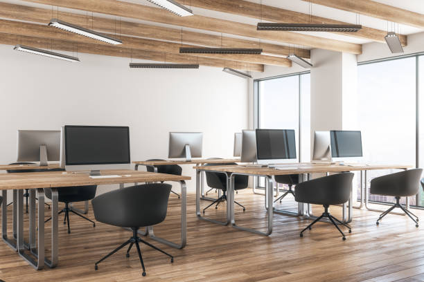 istock Wooden coworking office with empty laptop 1067795562