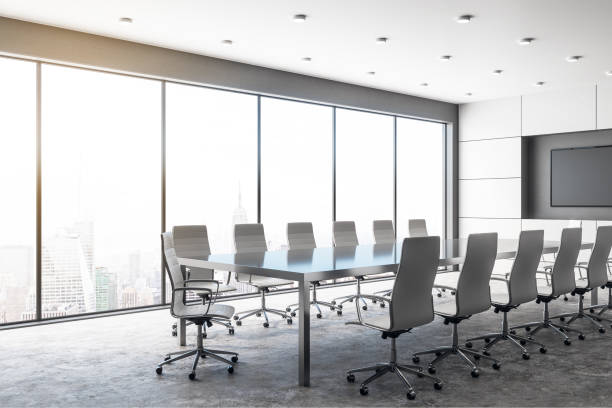istock Modern concrete meeting room with poster 1067795586
