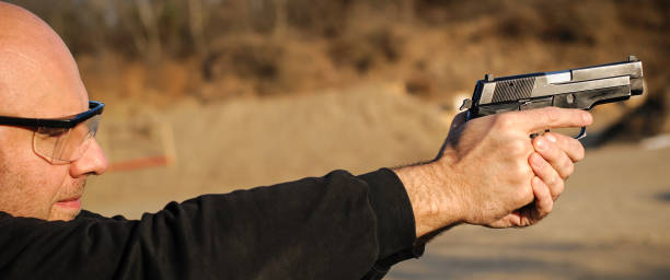 istock Target gun shoot practice and weapons training. Outdoor shooting range 1067799780