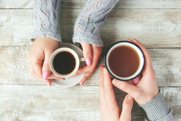 istock A cup of tea in the hands. Selective focus. 1067800930