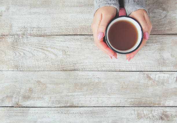 istock A cup of tea in the hands. Selective focus. 1067800994