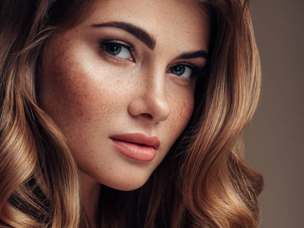 istock Young beautiful model with long wavy well groomed hair 1067802620