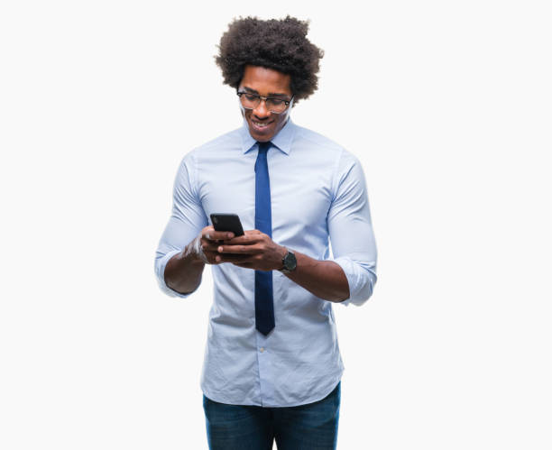 istock Afro american business man texting using smartphone over isolated background with a happy face standing and smiling with a confident smile showing teeth 1067805844