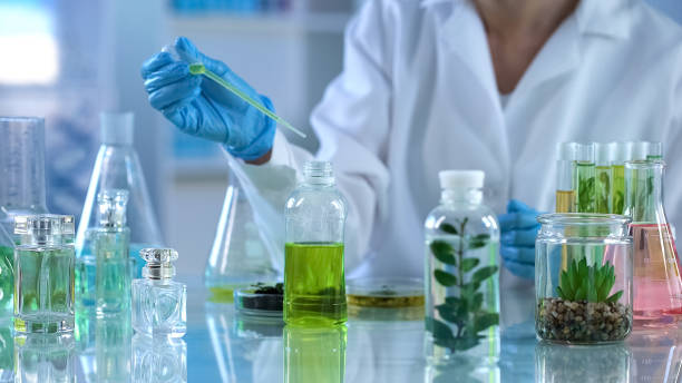 istock Chemistry scientist analyzing liquid mixture, herbal extract for perfumes 1067807118