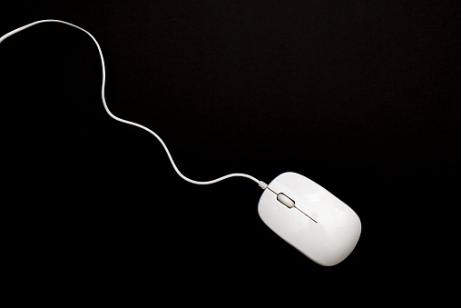 Computer mouse on black background
