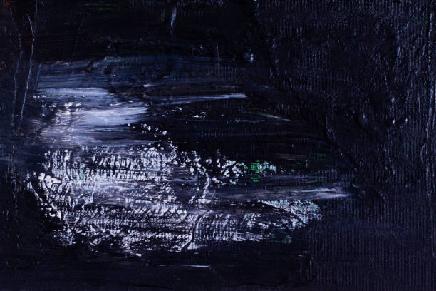 istock Paint smudges frozen on a dark blue palette. 1067810786