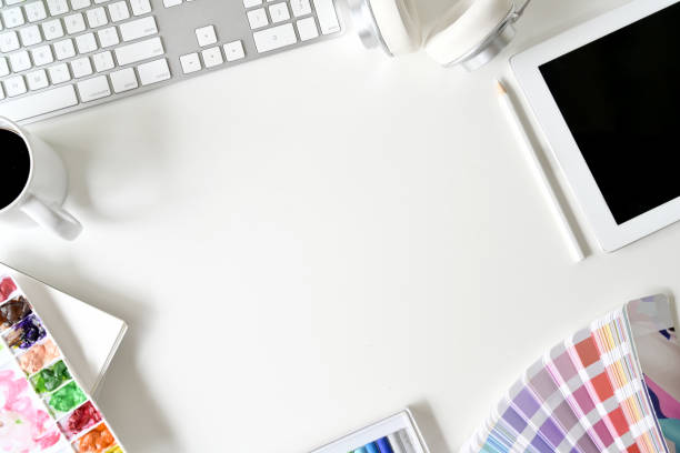 istock Artist designer white desk workspace with colour and supplies 1067814082
