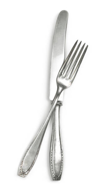 istock Old silver cutlery, isolated on white background 1067816492