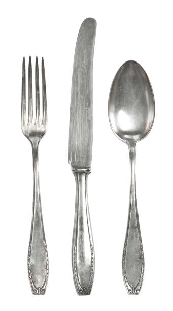 istock Old silver cutlery, isolated on white background 1067816500