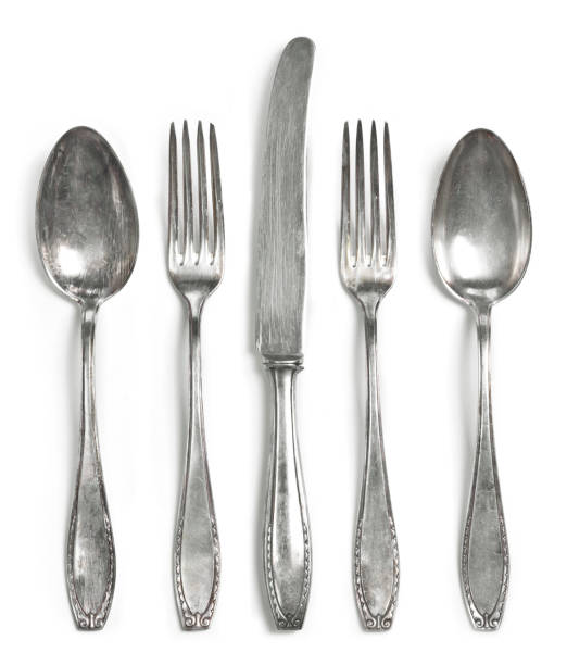istock Old silver cutlery, isolated on white background 1067816546