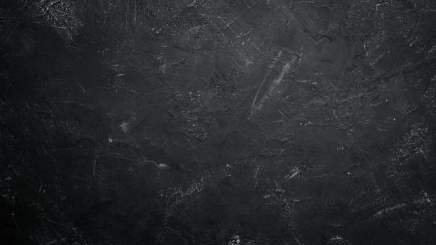 istock Black stone background. Black surface. Top view. Free space for your text. 1067819824