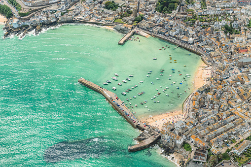 Aerial Views over St. Ives, harbour, Cornwall on a sunny June day.