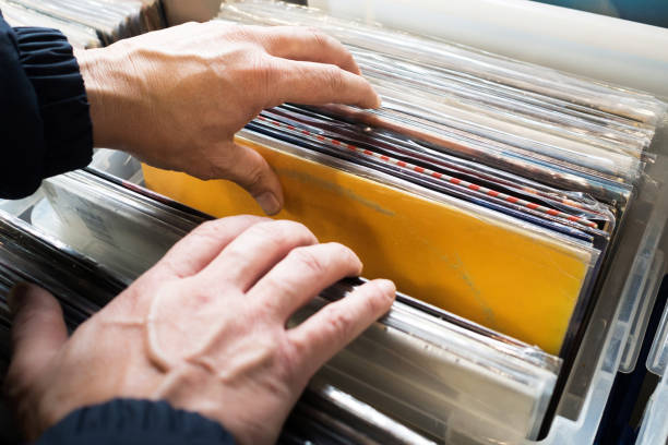 istock Close-up of man's hands, searching a second hand vinyl record. 1067824650