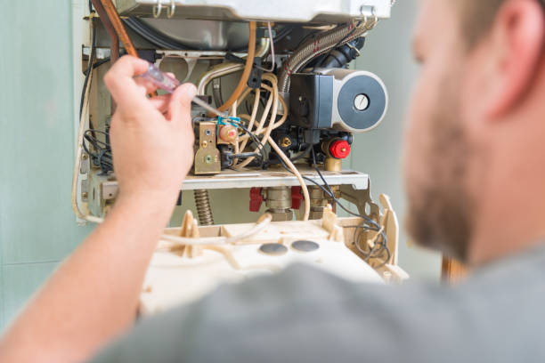 istock Technician repairing Gas Furnace 1067826328