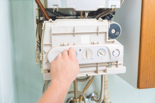 istock Technician repairing Gas Furnace 1067826334