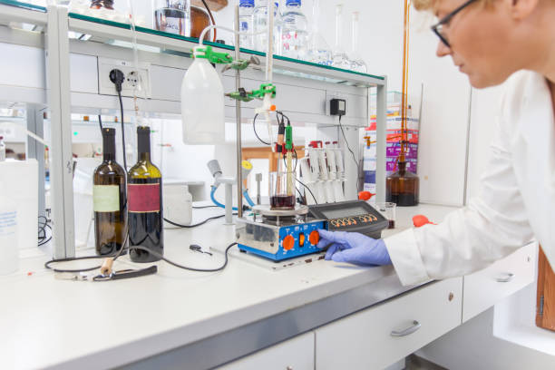 istock Researcher Measuring pH Value and Total Acidity in Red Wine 1067828808