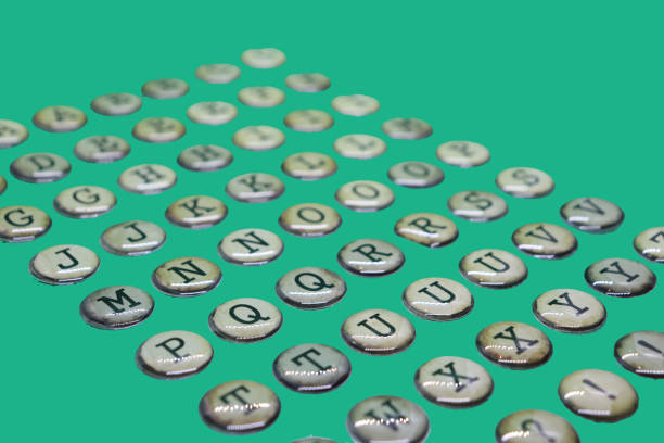 capital letters g, j, k, m, n, p, q, s, t of alphabet, in retro circles like typewriter keys, on plain green background - letter j block toy alphabet imagens e fotografias de stock