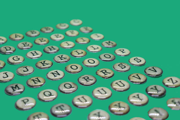 capital letters j, k, m, n, p, q, t of alphabet, in retro circles like typewriter keys, on plain green background - letter l letter p letter j letter m imagens e fotografias de stock