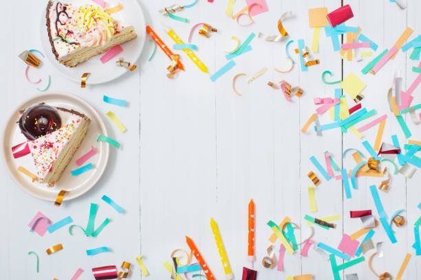 istock birthday cake and  decoration on white wooden background 1067831932