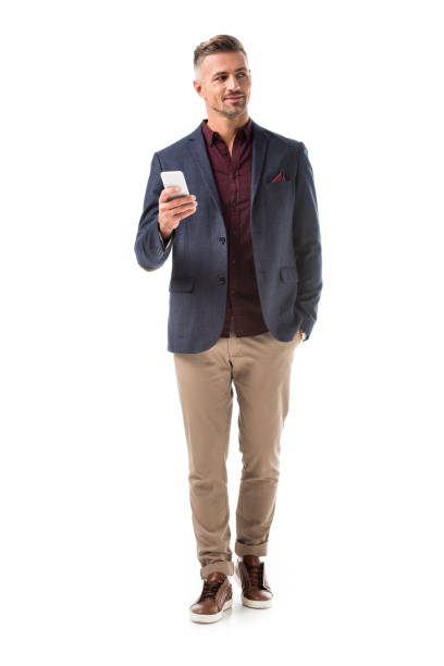 istock handsome adult stylish man in jacket using smartphone isolated on white 1067832566